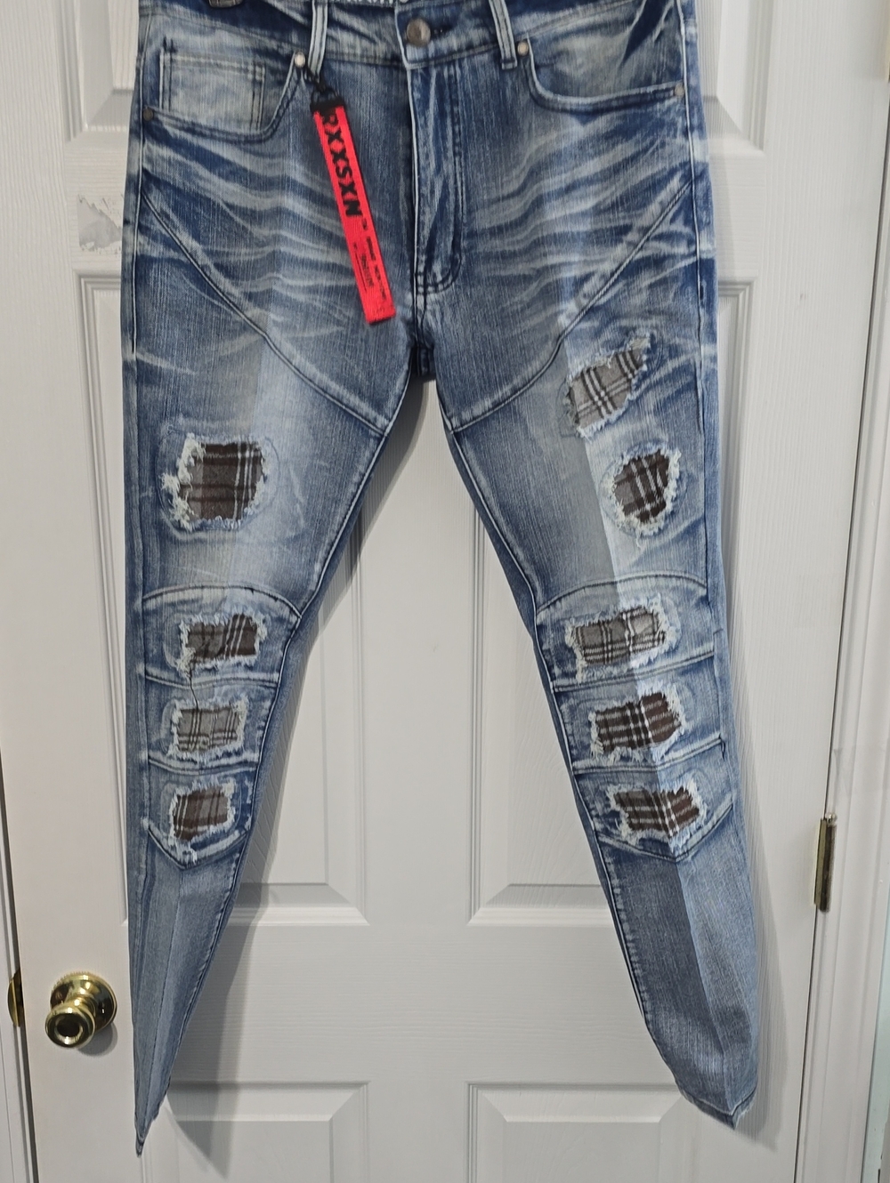 Reason Slim Distressed Blue Jeans with Plaid Patch Accents